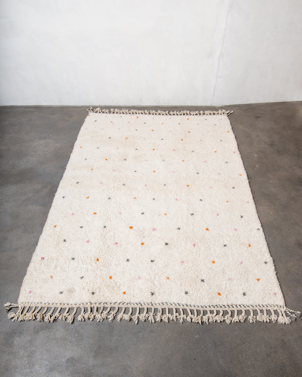 Modern, designer, handcrafted Berber rug from Morocco. Beniourain carpet with beautiful colours and patterns and fluffy wool texture.